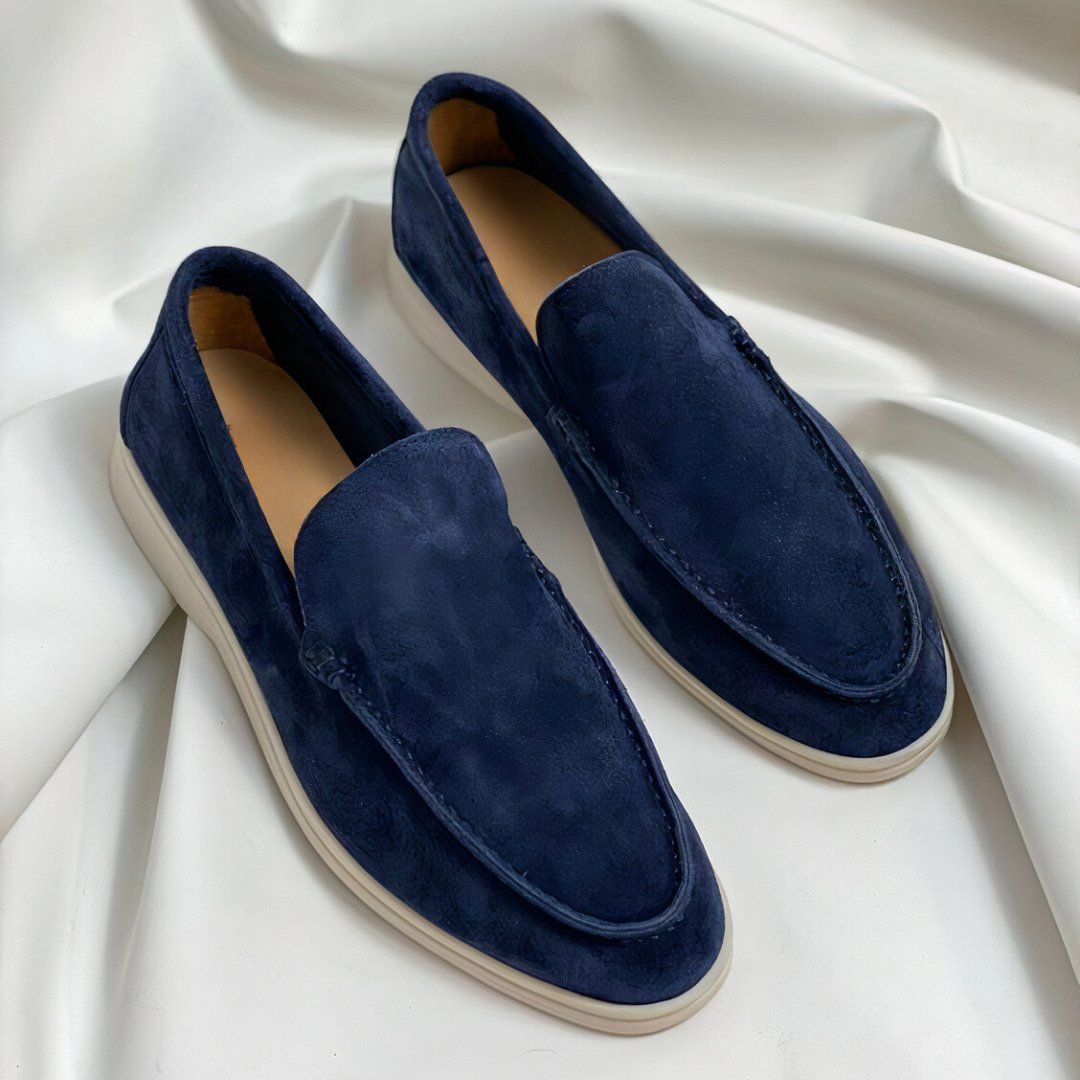 Women’s suede leather loafers, dark blue slip-on with stitched moc toe.