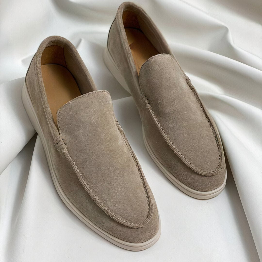 Women’s suede leather loafers, beige slip-on with stitched moc toe.