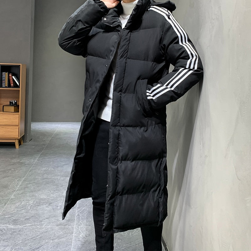 Black long puffer winter jacket with hood, white stripe sleeves, and button front