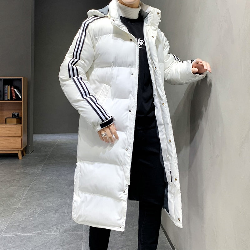 White long puffer winter jacket with hood and black triple stripe sleeve accents
