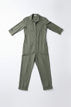 Women’s green button-front jumpsuit with collared shirt, ankle-length wide legs