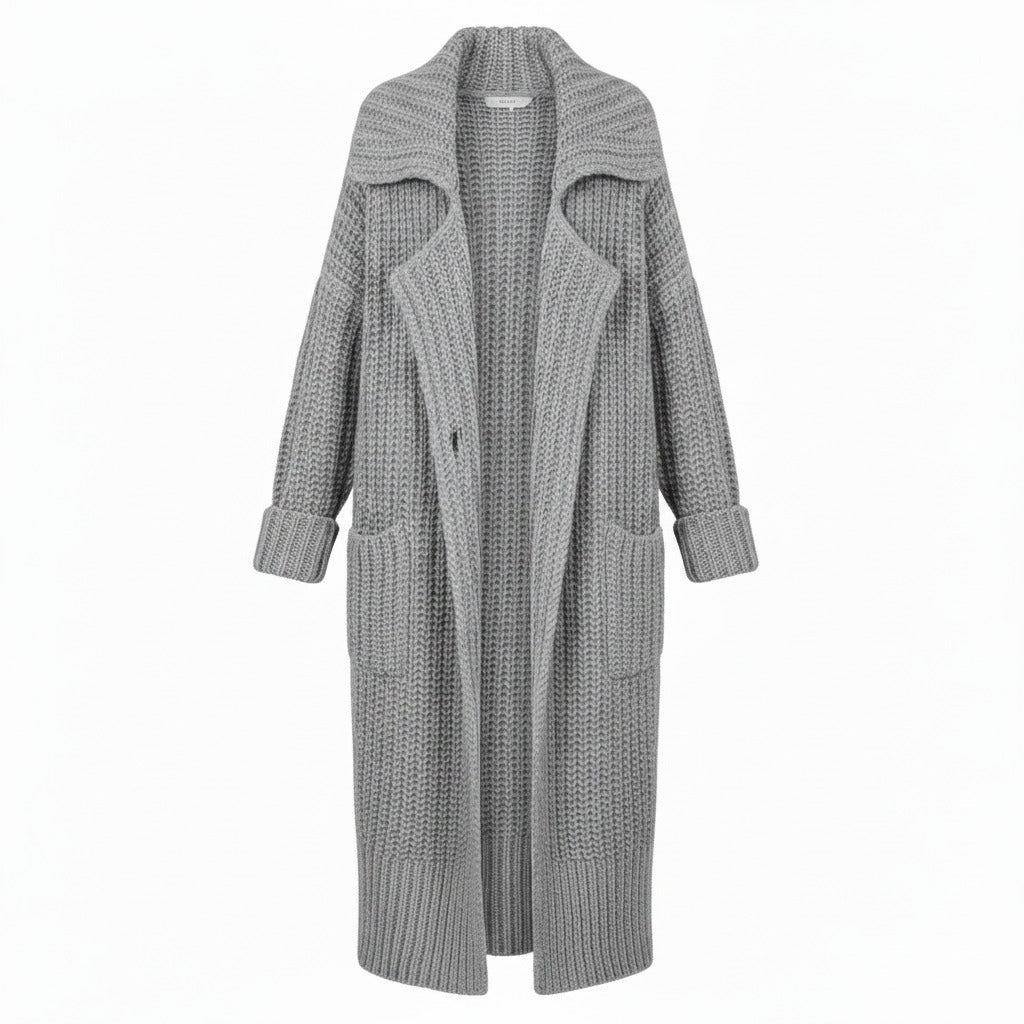 Grey chunky rib-knit longline cardigan with open front and side pockets, draped fit