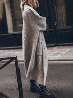 Grey chunky rib-knit longline cardigan shown from the side, open front with ribbed texture