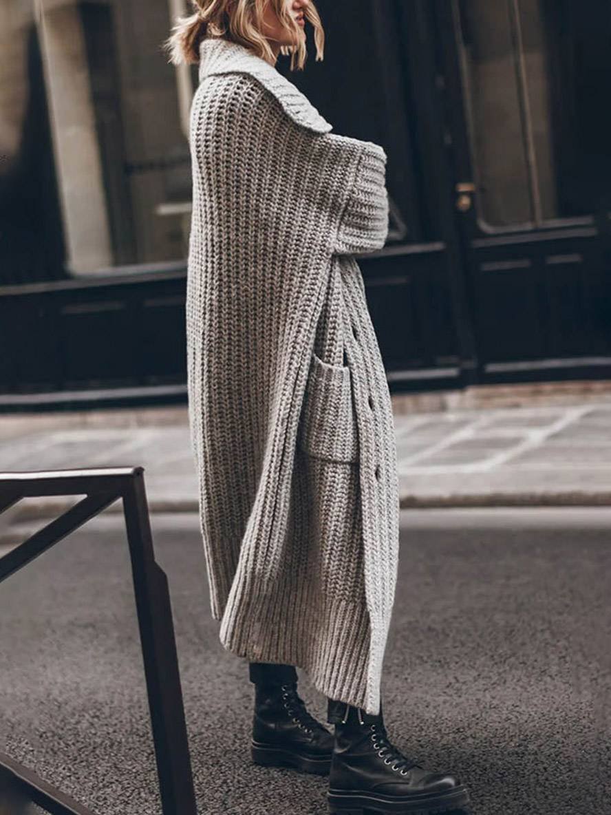 Grey chunky rib-knit longline cardigan shown from the side, open front with ribbed texture