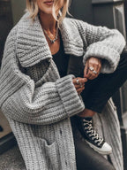 Grey chunky rib-knit longline cardigan, thick rib texture, open front and relaxed drape