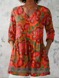 Long V-neck blouse with 3/4 sleeves, red orange floral leaf print