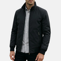 Men's black windbreaker jacket with full zip, stand collar, and zip pockets.