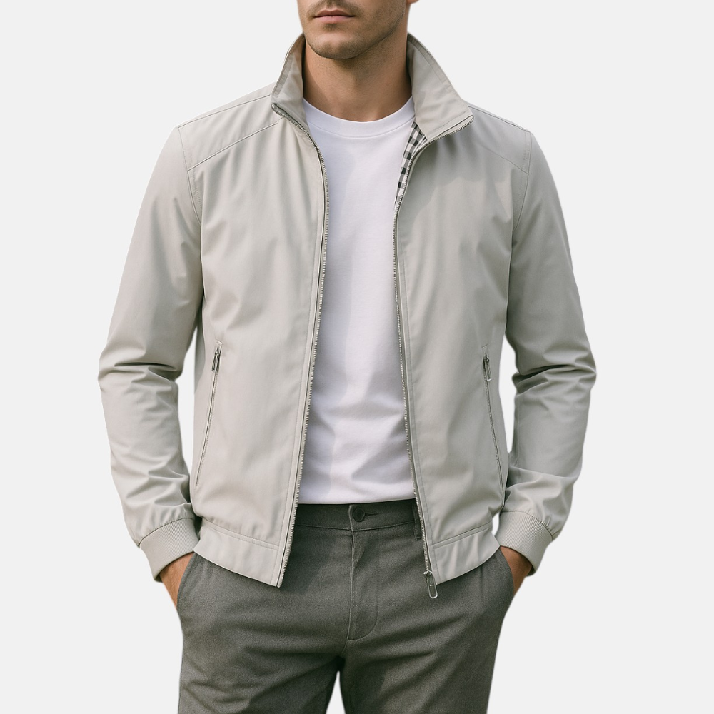 Men's light gray windbreaker jacket with full zip, stand collar, and ribbed cuffs.