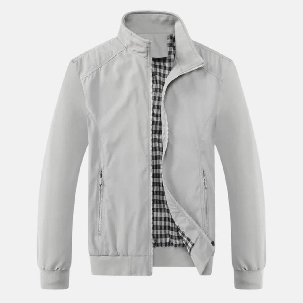 Men's white windbreaker jacket with full zip, stand collar, and two front zip pockets.
