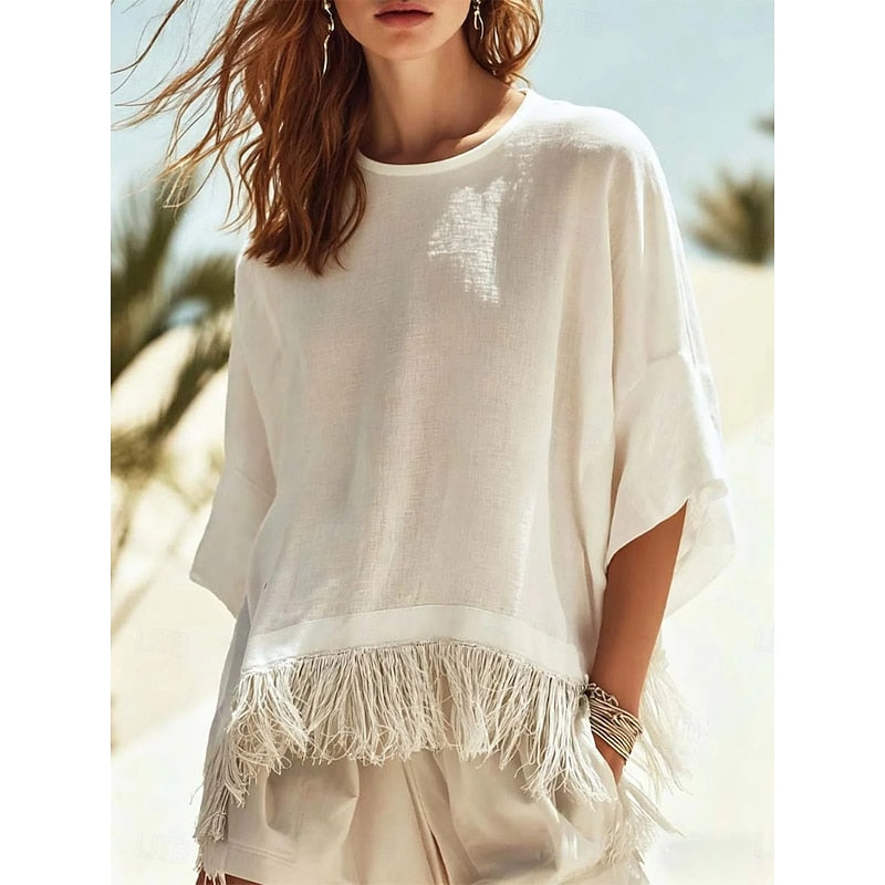 Relaxed fringe-hem blouse, loose fit, off-white with tassel edging at the hem