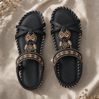 Black orthopedic cushioned strap sandals with ankle straps and ornate beaded charms, open toe