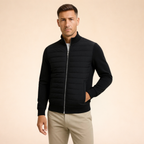 Men's black hybrid puffer jacket with full-zip and ribbed knit cuffs