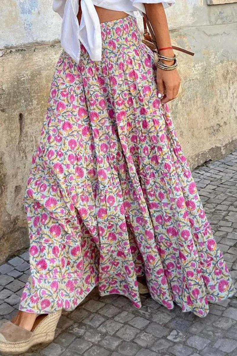 Women's cream maxi skirt with pink floral print, elastic waist, voluminous gathered hem