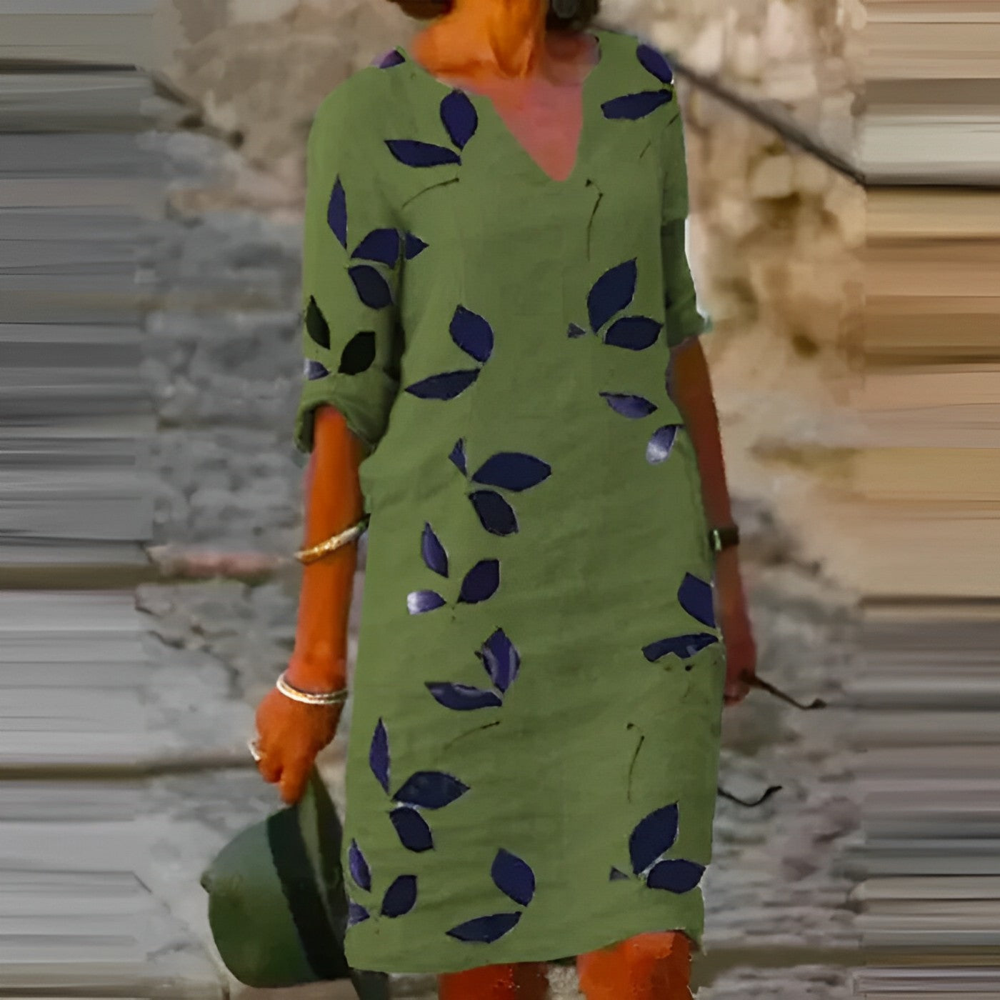 V-neck short-sleeve summer dress in green with navy leaf print