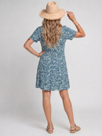 Blue tropical print knee-length dress with short sleeves, back view