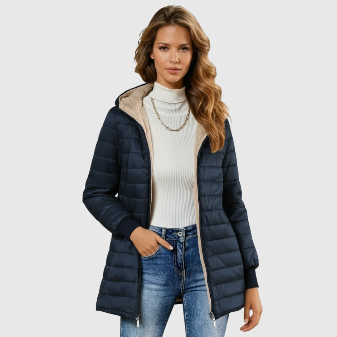 Navy sherpa-lined winter coat with tan faux-fur hood and zip front