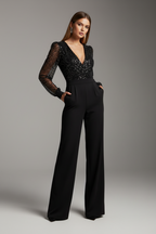 Black V-neck jumpsuit with sheer long sleeves and wide trouser legs