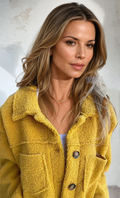 Yellow short cozy coat with fuzzy texture, button front, collar, and side pockets