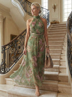 Women’s sage green floral sleeveless halter midi dress with gathered bodice and elastic waist