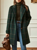 Dark green checked coat with button front, notched lapels, and long sleeves