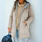 Light beige hooded puffer winter coat with full zip front and side pockets