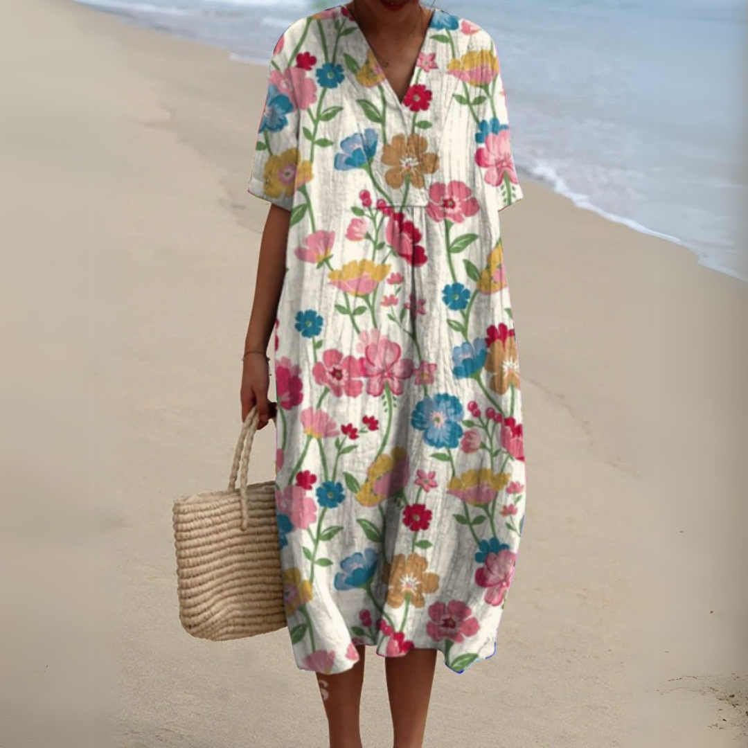 Women’s printed V-neck midi dress with adjustable waist, white base with colorful blooms