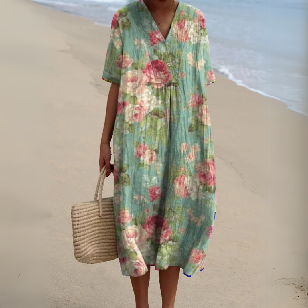 Women’s printed V-neck midi dress with adjustable waist, teal with pink floral print