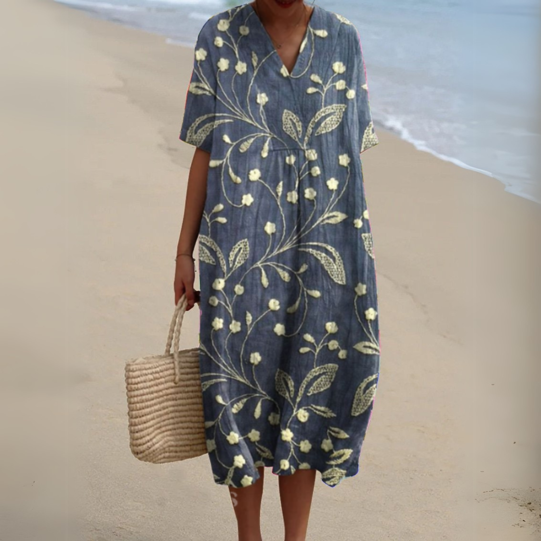 Women’s printed V-neck midi dress with adjustable waist, navy with gold botanical pattern