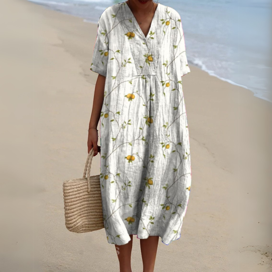 Women’s printed V-neck midi dress with adjustable waist, light grey with yellow flower dots