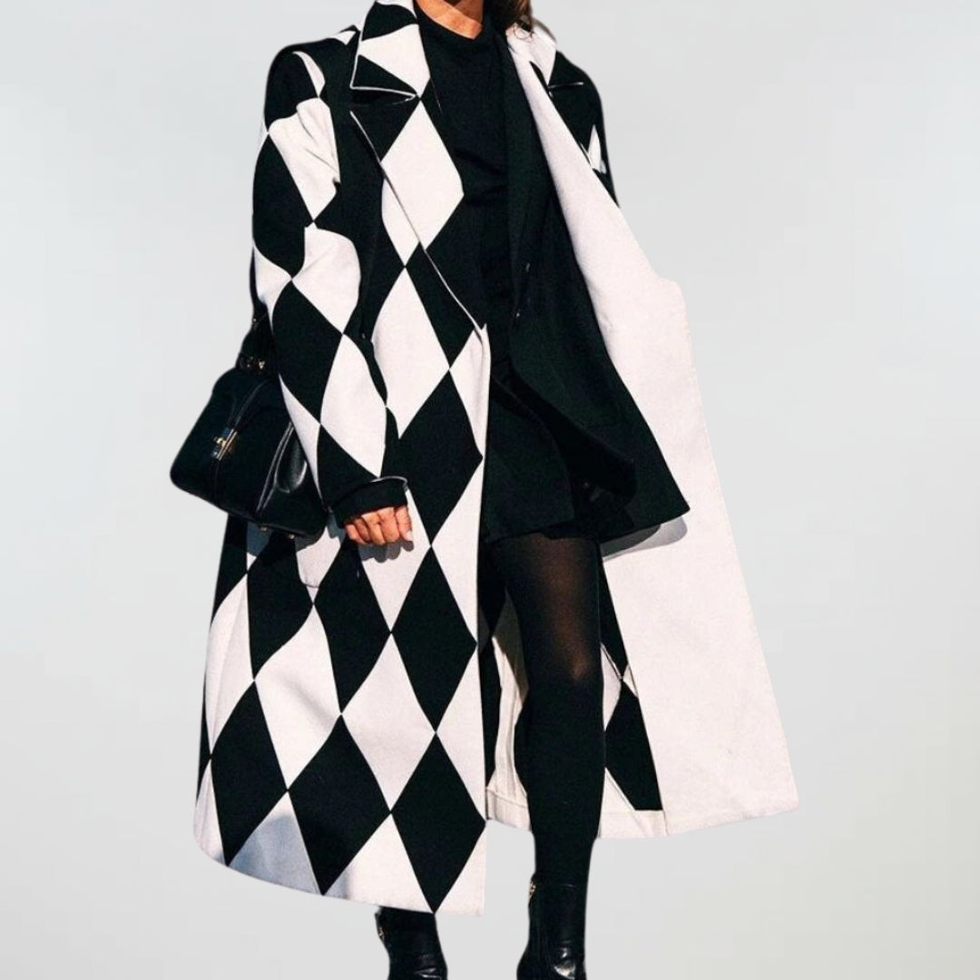 Oversized black-and-white diamond patterned coat with open front and side pockets