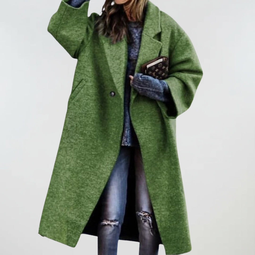 Green oversized coat with button front and side pockets, long sleeves