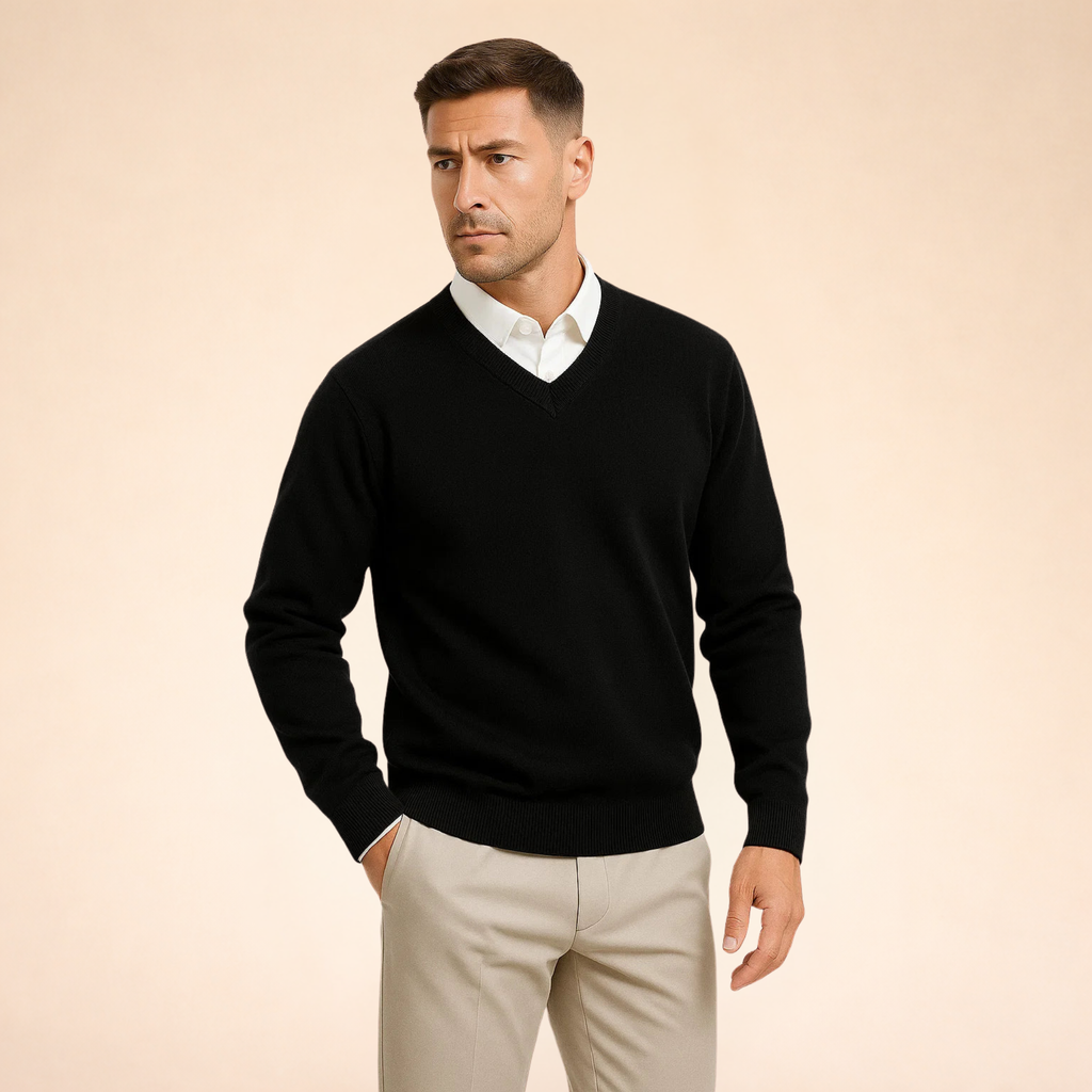 Black cashmere V-neck sweater with long sleeves, ribbed collar, cuffs, and hem.
