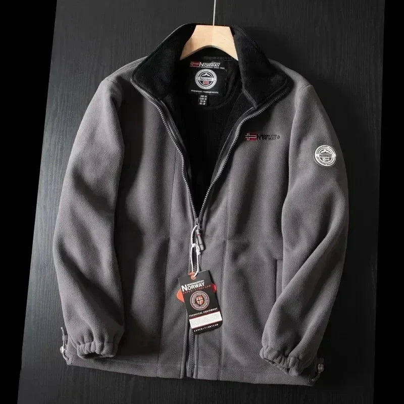 Gray premium fleece vest with black stand collar and full-zip front.
