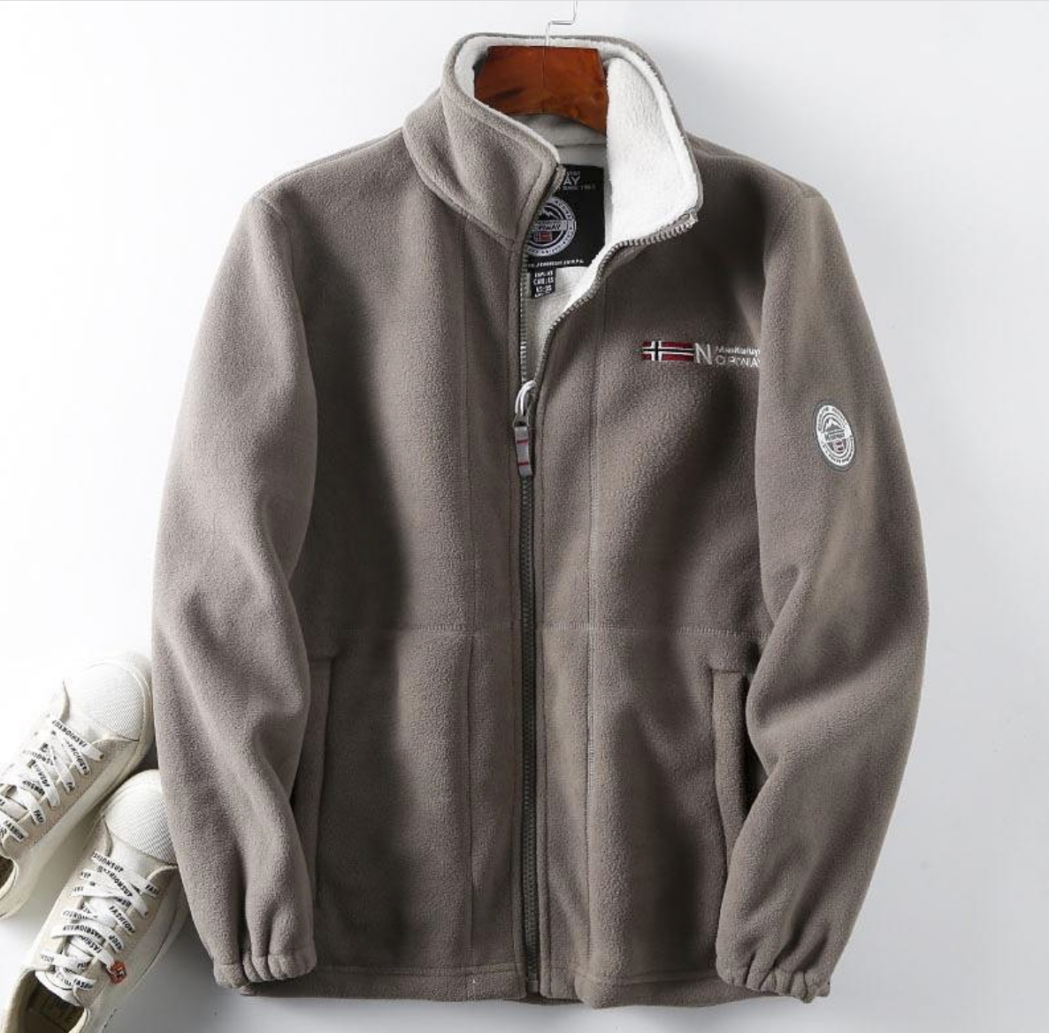 Light gray premium fleece vest with high collar and full-zip front.