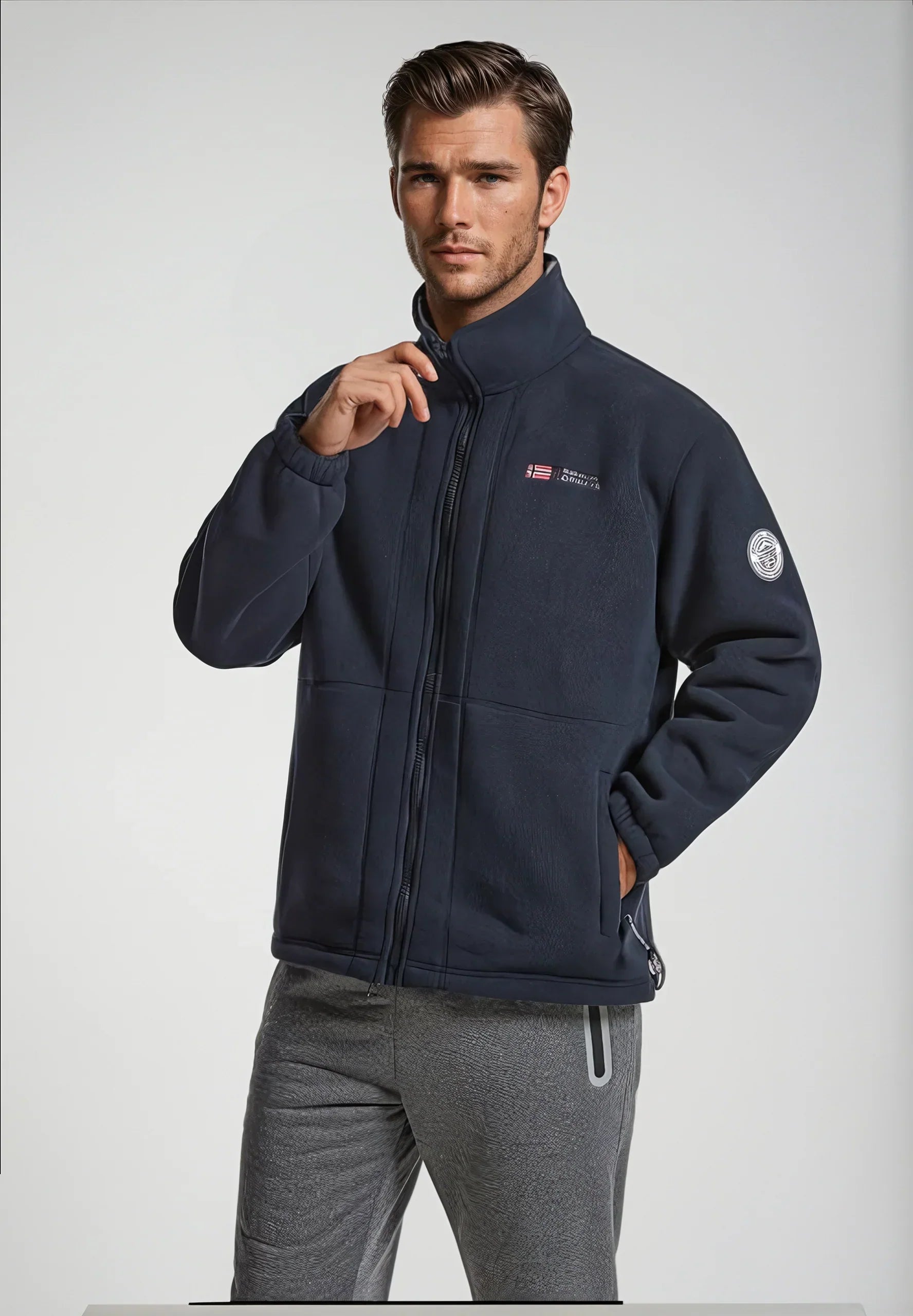 Navy premium fleece vest on model with gray collar and full-zip front.