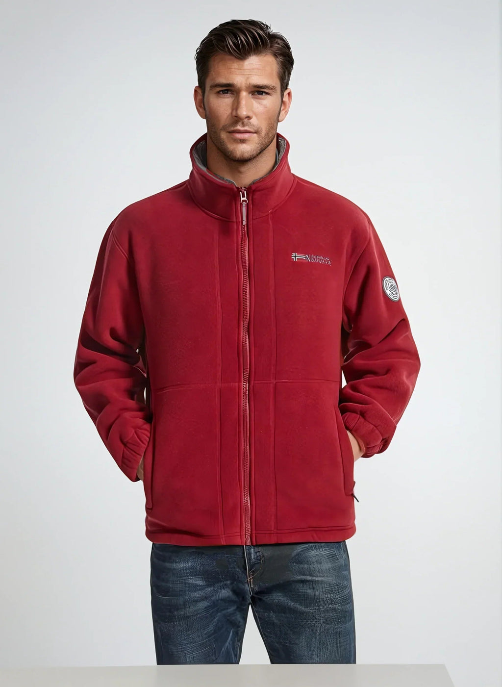 Red premium fleece vest on model with full-zip front and stand collar.