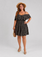 Black floral cold-shoulder ruffle dress with gathered waist and flared skirt.