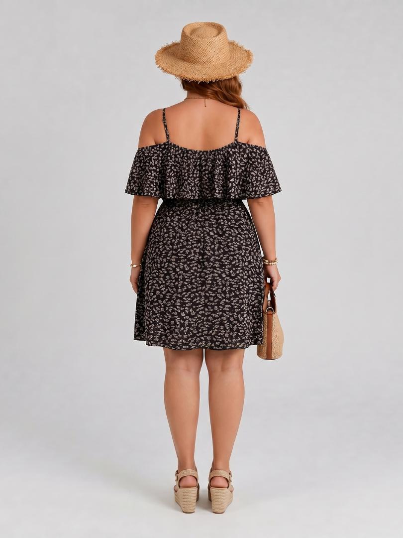Black floral cold-shoulder dress with ruffled back neckline and gathered waist.