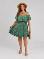 Green floral cold-shoulder ruffle dress with gathered waist and flared skirt.