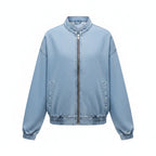 Light-blue denim zip-up bomber jacket with stand collar and front zipper