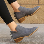 Suede wedge-heel ankle boots with pointed toe in charcoal gray, side zip detail