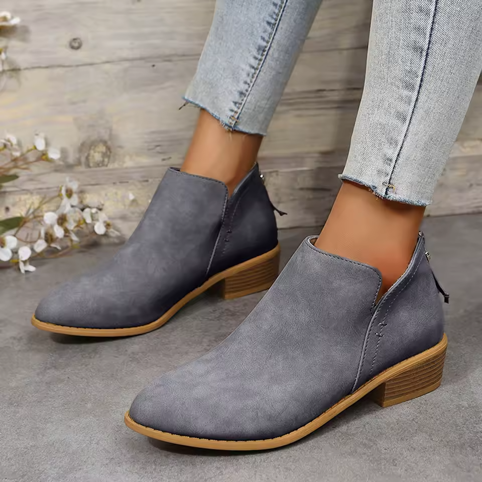 Suede wedge-heel ankle boots with pointed toe in slate gray, side zip detail