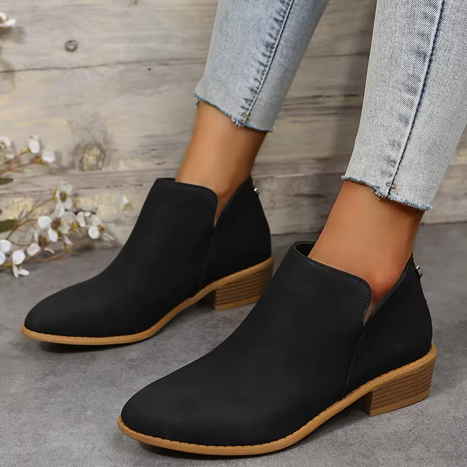 Suede wedge-heel ankle boots with pointed toe in black, side zip detail
