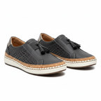 Women's dark gray slip-on textile sneakers with tassel detail and stitched rubber sole