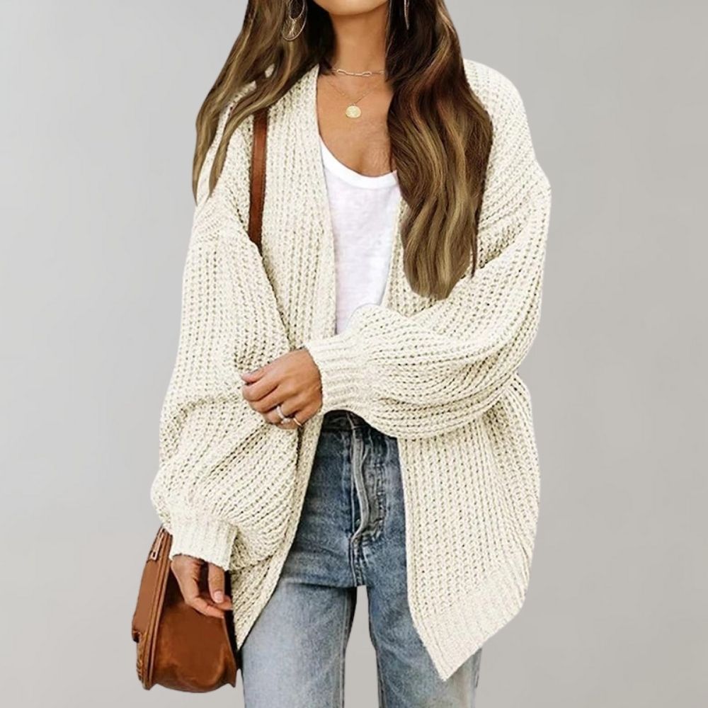 Cream white oversized knit cardigan, long sleeves, open-front chunky knit drape