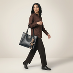 Women’s compact structured synthetic leather crossbody bag in dark brown, front pocket