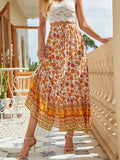 Bohemian floral A-line maxi skirt, elastic high waist, tiered border hem, orange print.