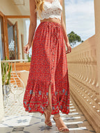 Bohemian floral A-line maxi skirt, elastic high waist, tiered border hem, red print.
