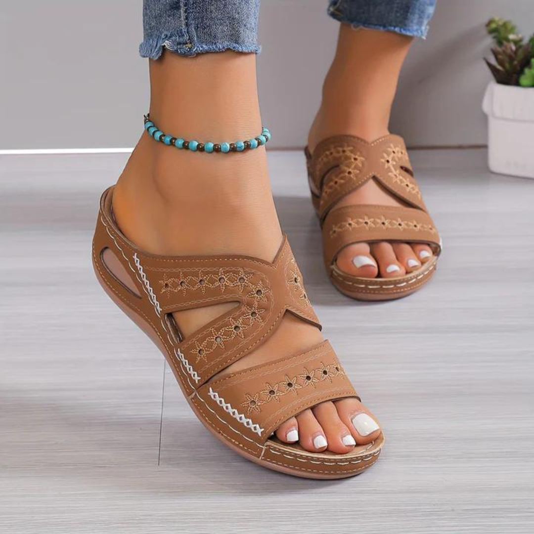 Women’s cutout wedge sandals in tan brown with embroidered straps and cushioned footbed
