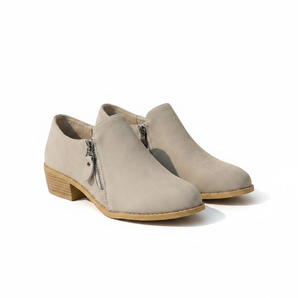 Beige women's ankle boots with side zipper and block heel, suede-like upper